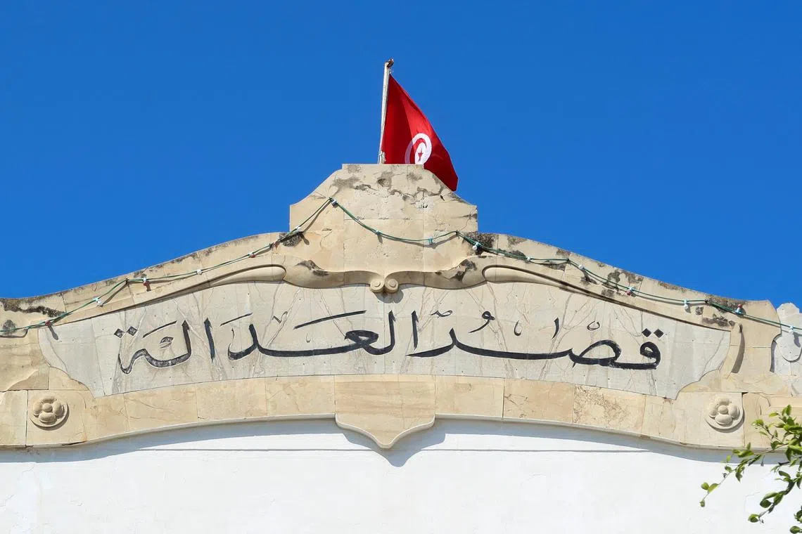 File photo: A Tunisian flag flutters atop of the Palace of Justice building in Tunis, Tunisia May 13, 2024. REUTERS/Jihed Abidellaoui/File photo