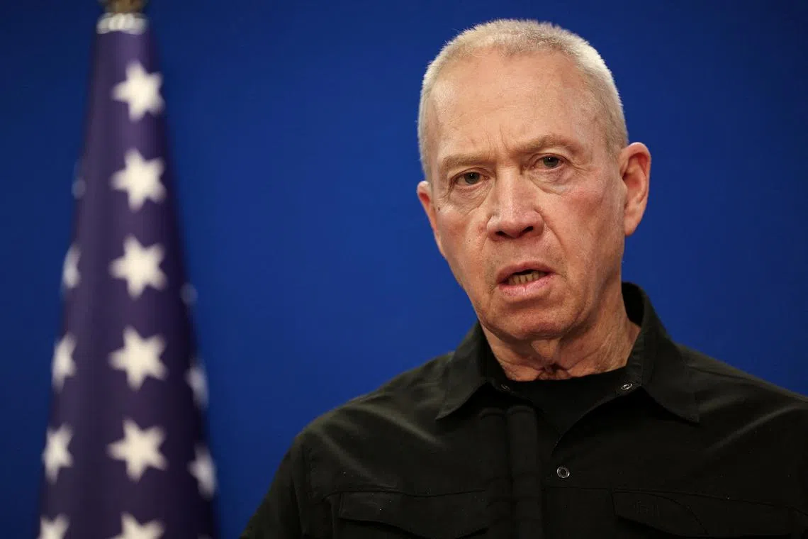 FILE PHOTO: Israeli Defence Minister Yoav Gallant speaks during a joint press conference with U.S. Secretary of Defense Lloyd Austin at Israel's Ministry of Defense in Tel Aviv, Israel December 18, 2023. REUTERS/Violeta Santos Moura/File Photo