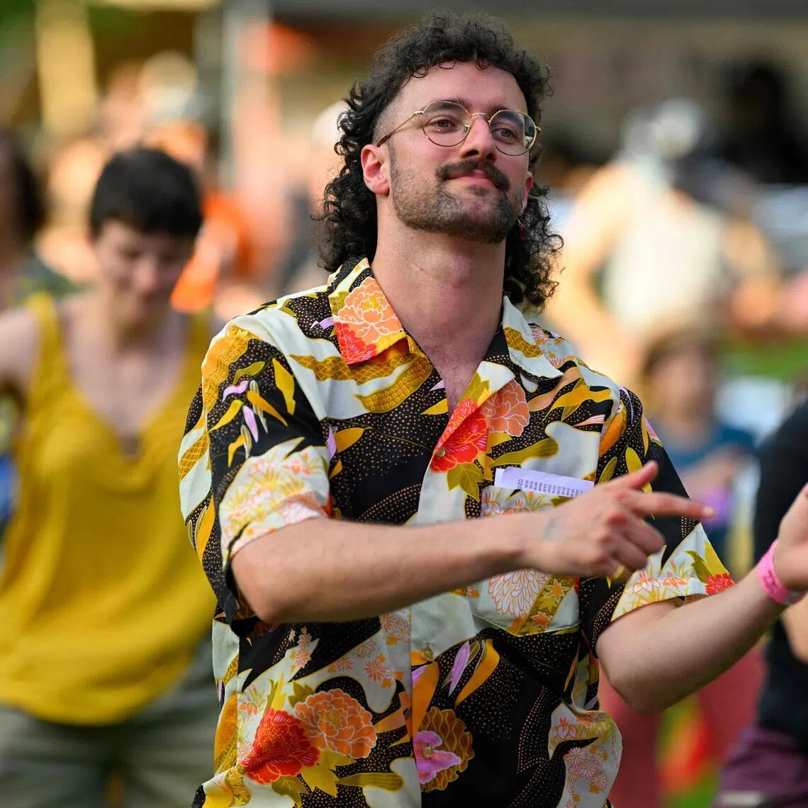 People take part in the annual European Mullet Cup in Belgium on May 23.