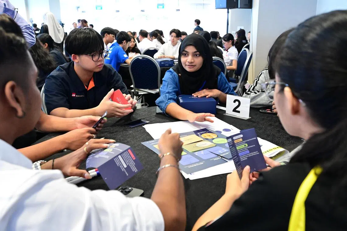 smrace28 - ITE students discussing race and religion issues at ITE College Central on Friday using a new civic conversation toolkit by the National Youth Council. 



Credit: NYC