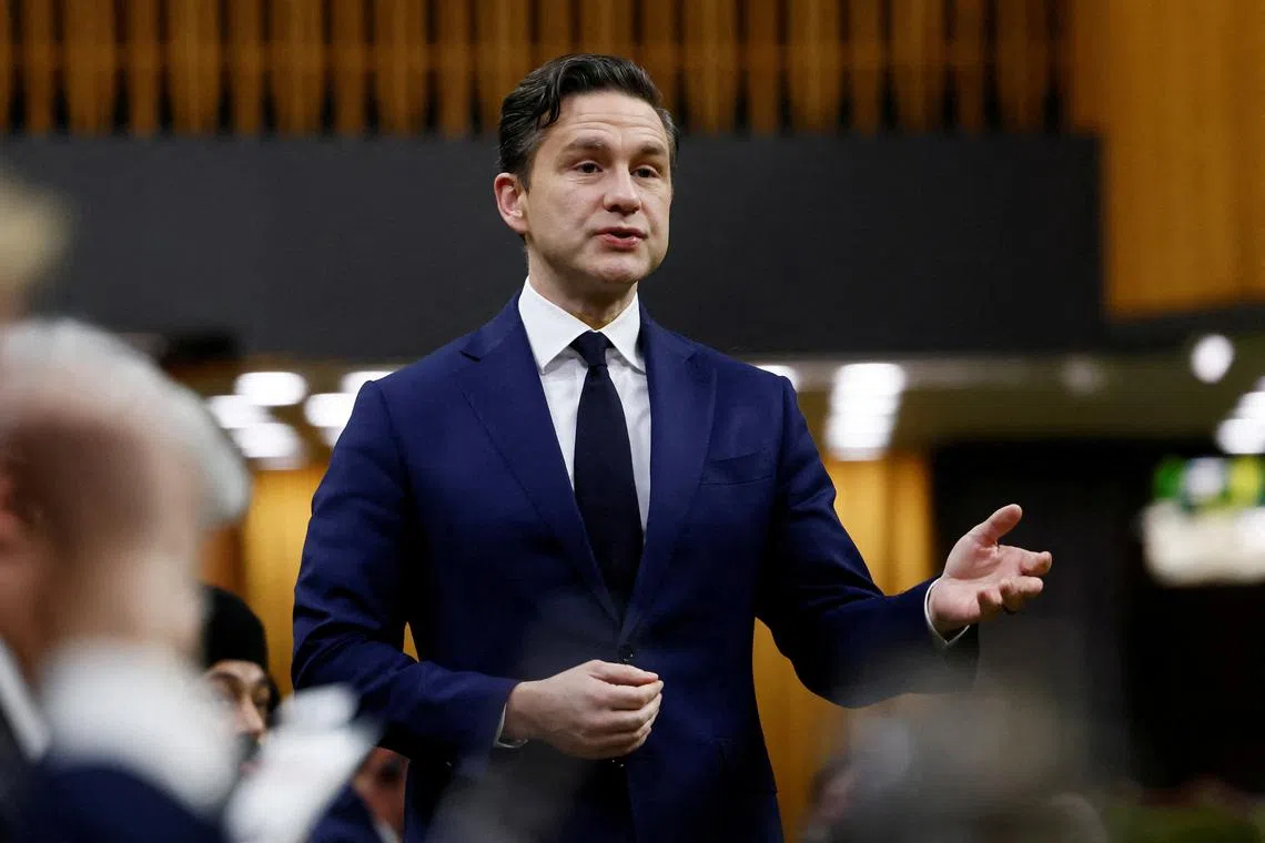 FILE PHOTO: Conservative Party of Canada leader Pierre Poilievre speaks during Question Period in the House of Commons on Parliament Hill in Ottawa, Ontario, Canada December 16, 2024. REUTERS/Blair Gable/File Photo