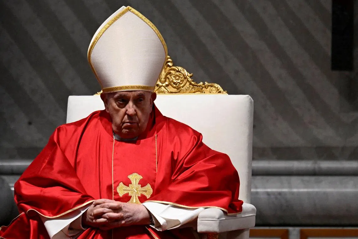 FILE PHOTO: Pope Francis presides over the Good Friday Passion of the Lord service in Saint Peter's Basilica at the Vatican, March 29, 2024. Vatican Media/­Handout via REUTERS/File Photo