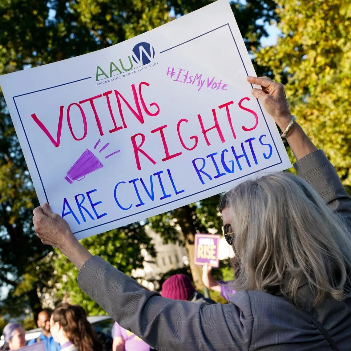 People protesting in Washington as the US Supreme Court heard arguments on the composition of Louisiana electoral districts, on Oct 15, 2025.