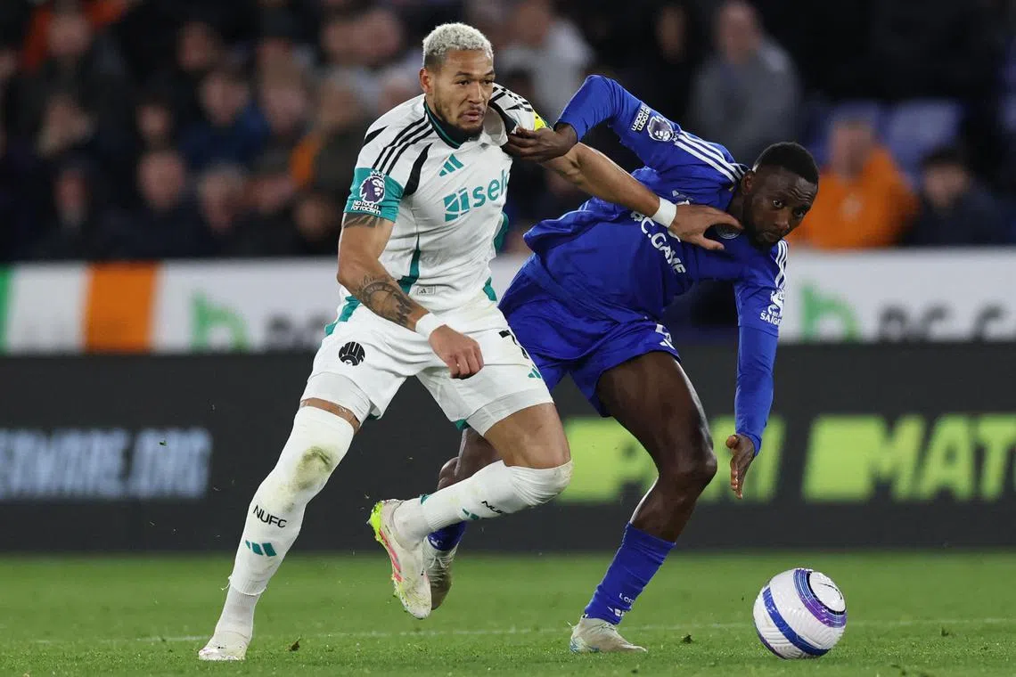Newcastle United's Joelinton (left) tussling with Leicester City's Wilfred Ndidi during an English Premier League match on April 7. 