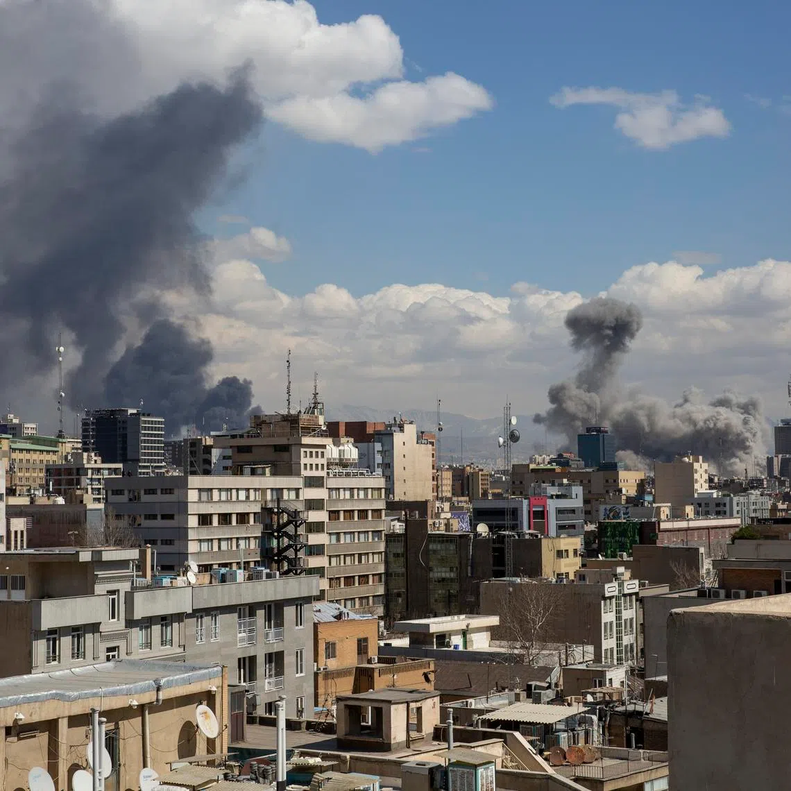 Smoke rises after coordinated U.S. and Israeli airstrikes in Tehran, Iran, on March 1.