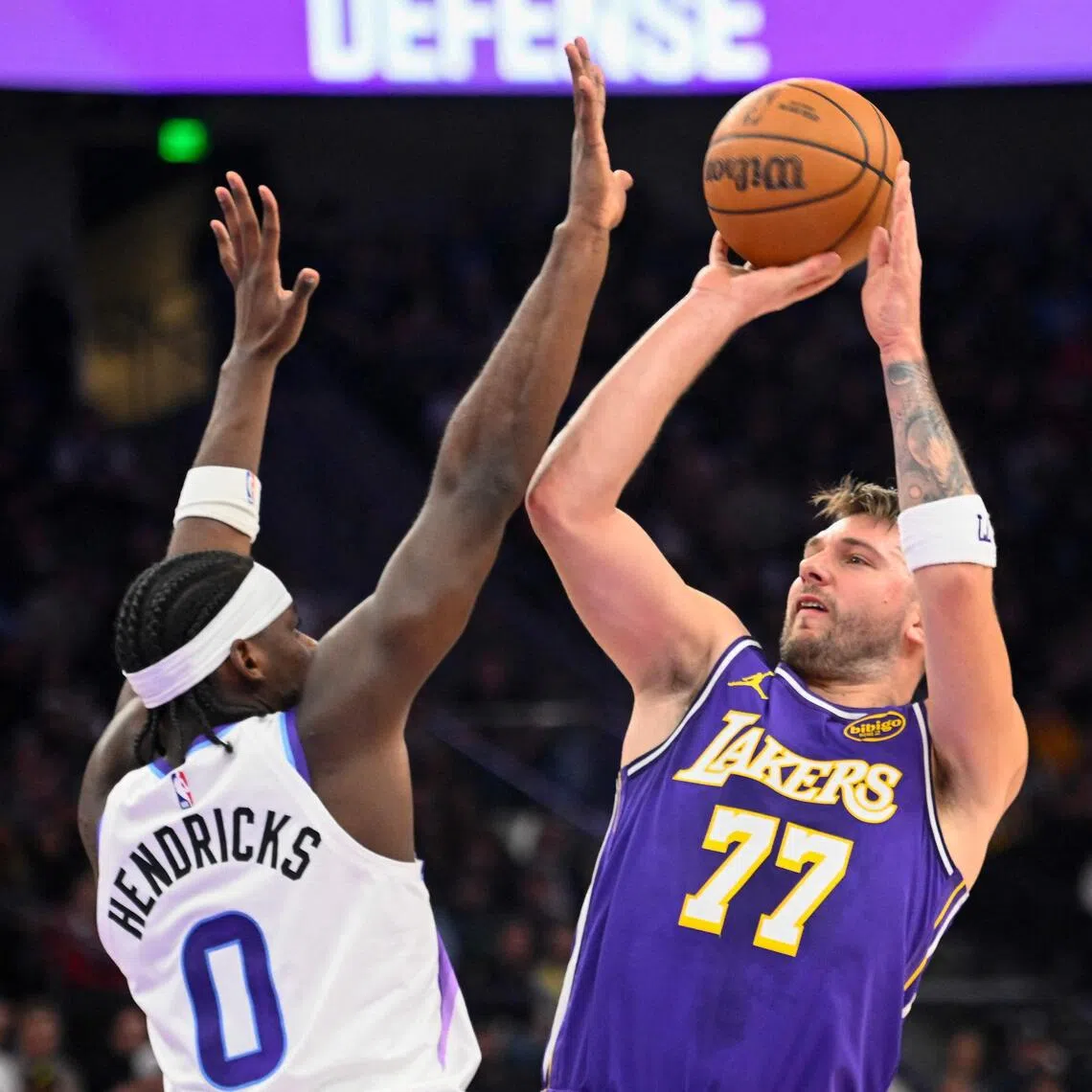 Luka Doncic of the Los Angeles Lakers shoots over Taylor Hendricks of the Utah Jazz during the second half of at Delta Center.