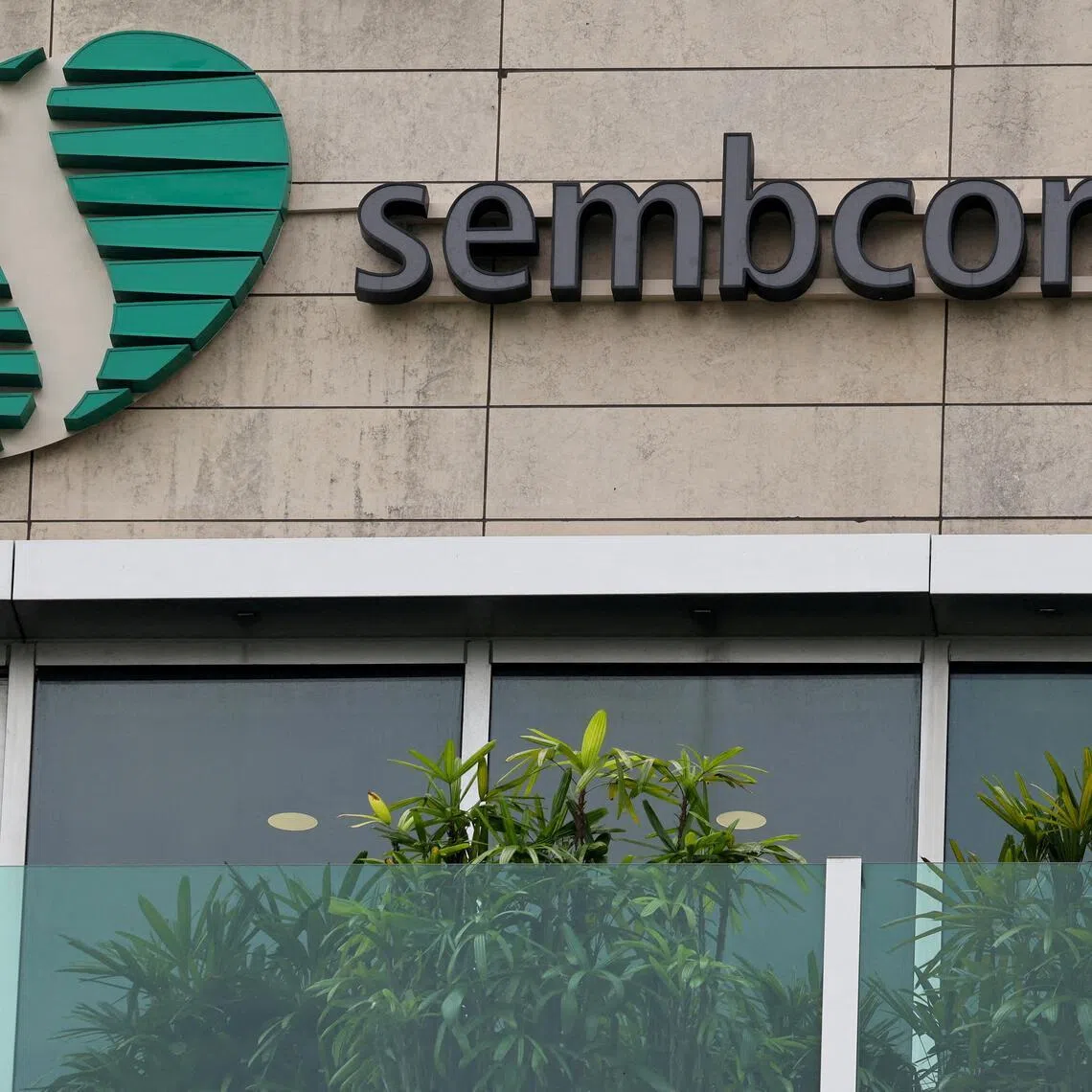 FILE PHOTO: A signage of Sembcorp Industries is pictured outside their office in Singapore May 14, 2025. REUTERS/Edgar Su  REFILE - CORRECTING YEAR FROM 2024 TO 2025./File Photo
