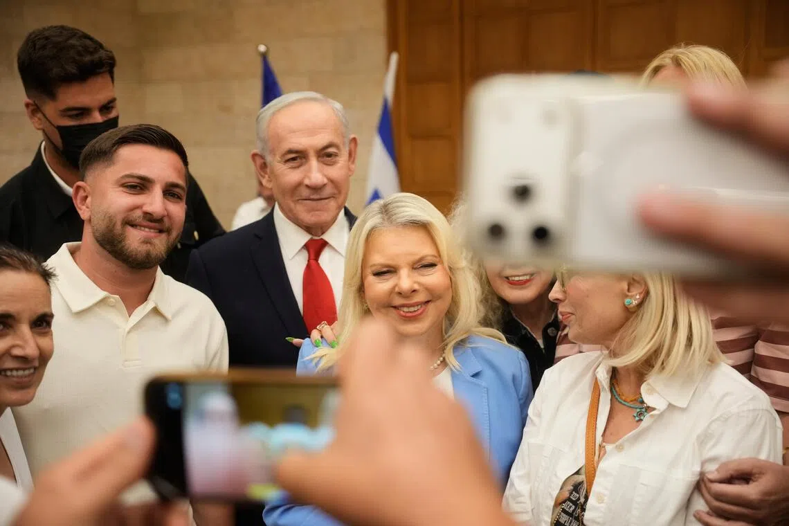 People taking a selfie with Israeli Prime Minister Benjamin Netanyahu and his wife, Sara Netanyahu, during the Likud party primary in Jerusalem, on Aug 17, ahead of Israel’s October general election.