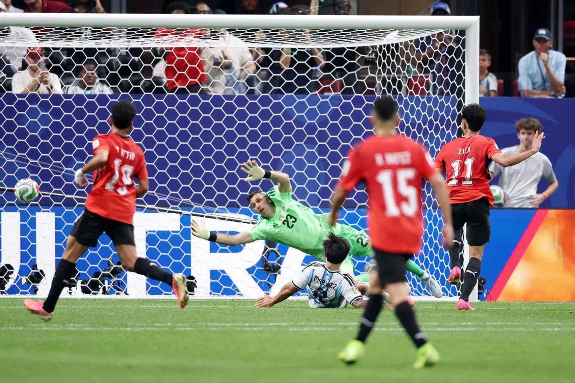 Egypt’s Mostafa Zico (right) scoring their second goal, which was disallowed.