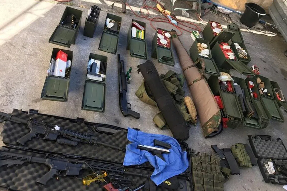 FILE PHOTO: Illegal high-capacity magazines and an assault rifle along with multiple guns, ammunition are seen in this Long Beach Police Department (LBPD) photo in Long Beach, California, U.S., released on August 21, 2019.   Courtesy LBPD/Handout via REUTERS