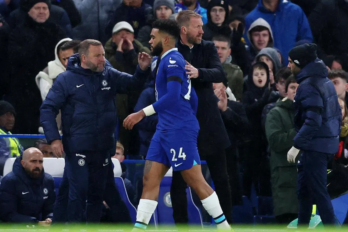 Chelsea's Reece James with manager Graham Potter after being substituted due to injury in the Premier League match against Bournemouth.