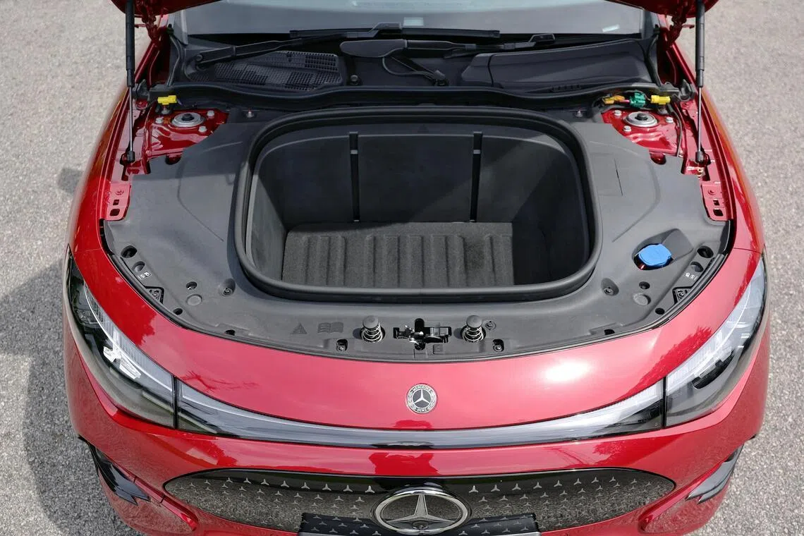 The car has an extra storage space in the front trunk, which is large enough to fit a cabin bag.