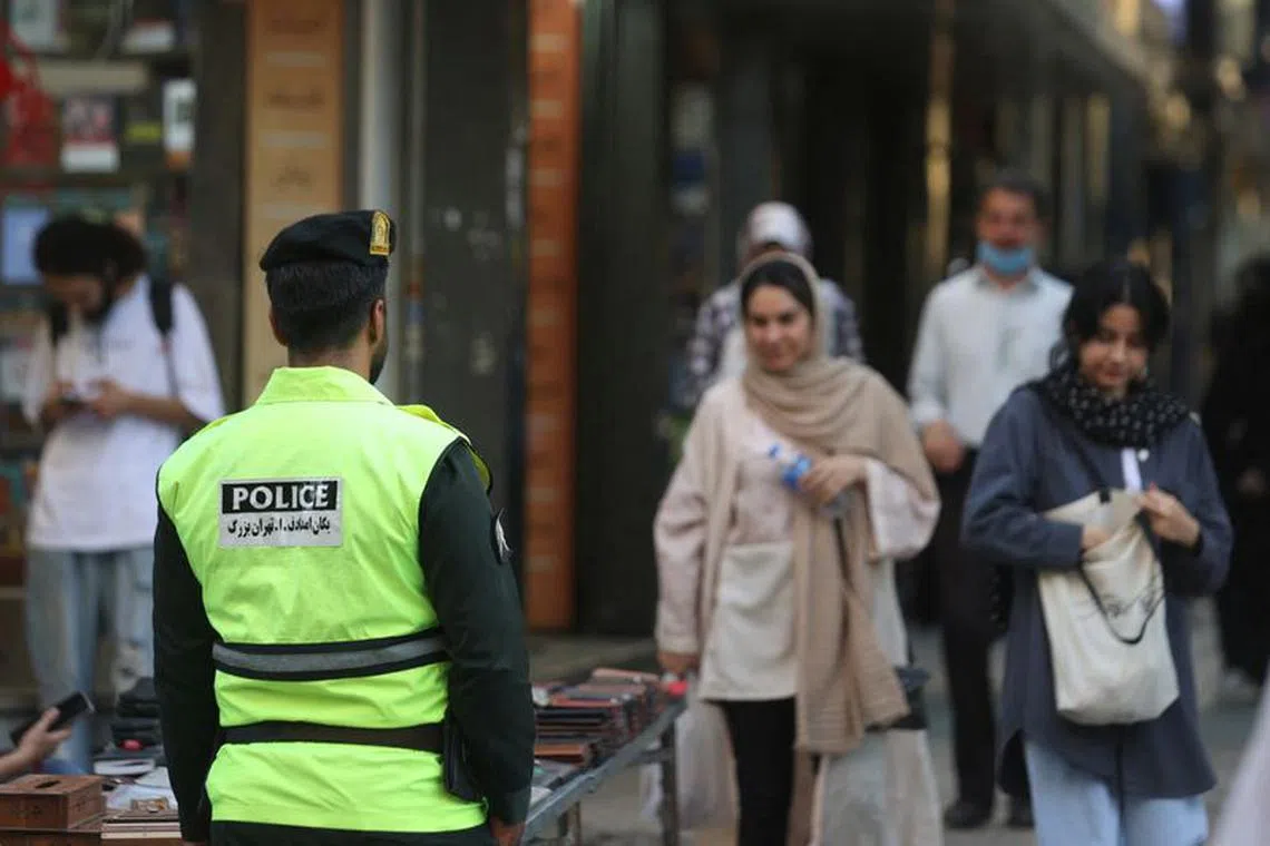 An Iranian police force stands on a street during the revival of morality police in Tehran, Iran, July 16, 2023. Majid Asgaripour/WANA (West Asia News Agency) via REUTERS/File Photo