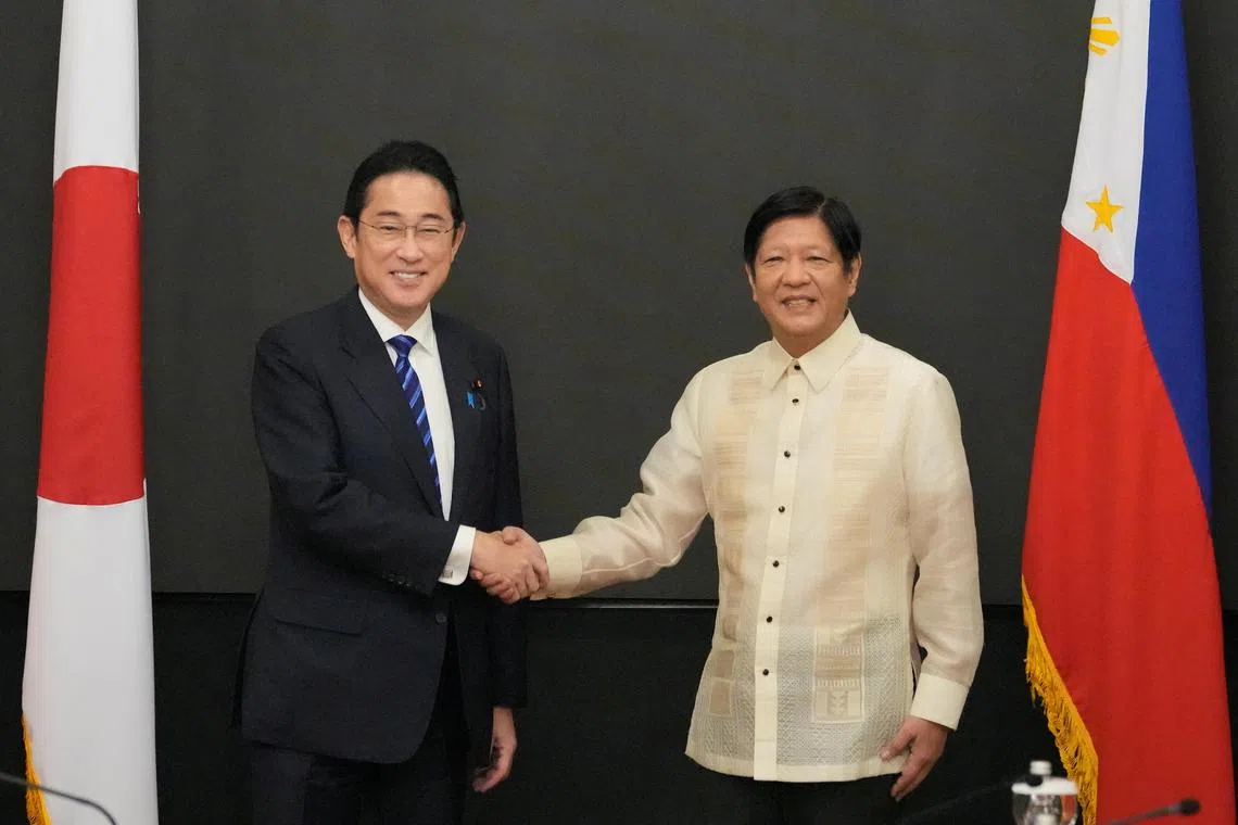 Japan Prime Minister Fumio Kishida shakes hands with Philippine President Ferdinand Marcos Jr at Malacanang Palace in Manila, Philippines on November 3, 2023. 