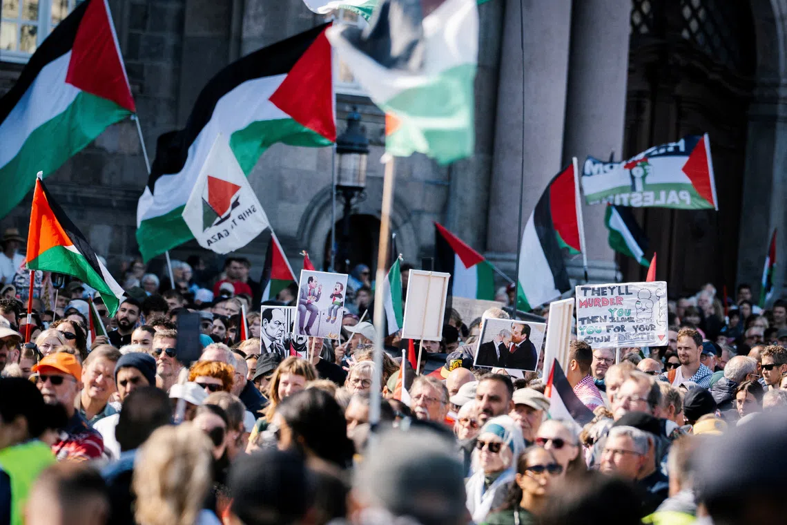 Protesters attend a demonstration in support of Palestinians in Gaza, in Copenhagen, on Aug 24.