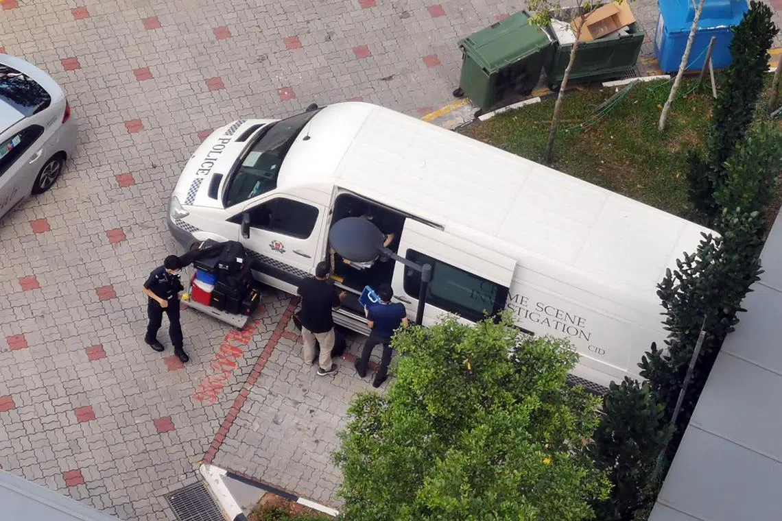 A Criminal Investigation Department vehicle outside a block in Ang Mo Kio Street 23 on 12 january 2022. A woman, Ms Isabel Elizabeth Francis was found dead in a second-floor unit in the morning. Her husband, David Brian Chow Kwok-Hun who was taken to hospital with injuries, was charged with the murder at the hospital by a field magistrate.