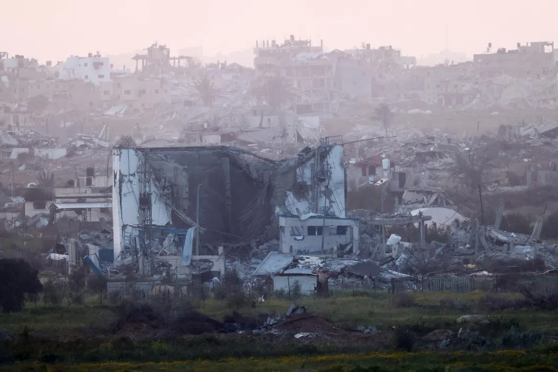 A damaged building from Gaza is pictured, amid the ongoing conflict between Israel and Palestinian Islamist group Hamas, as seen from Southern Israel, March 2, 2024. REUTERS/Amir Cohen