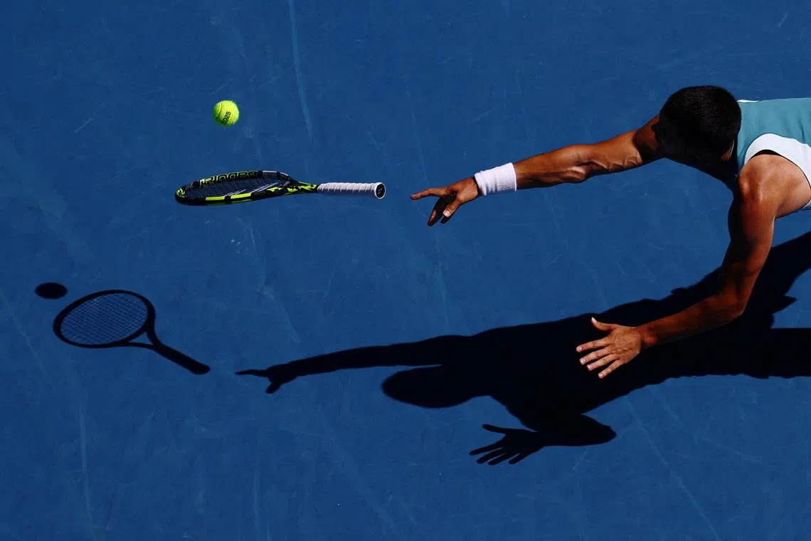 Carlos Alcaraz in full flight during his third round victory at the  Australian Open.