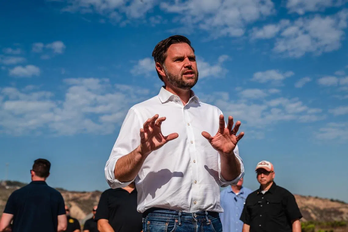 JD Vance speaks to reporters near San Diego on Sept 6, 2024. 
