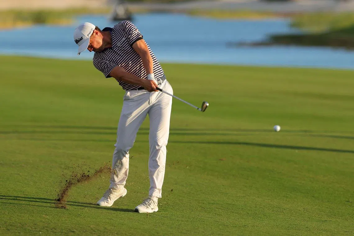 Justin Thomas of the United States plays a shot on the 18th hole during the third round of the Hero World Challenge.