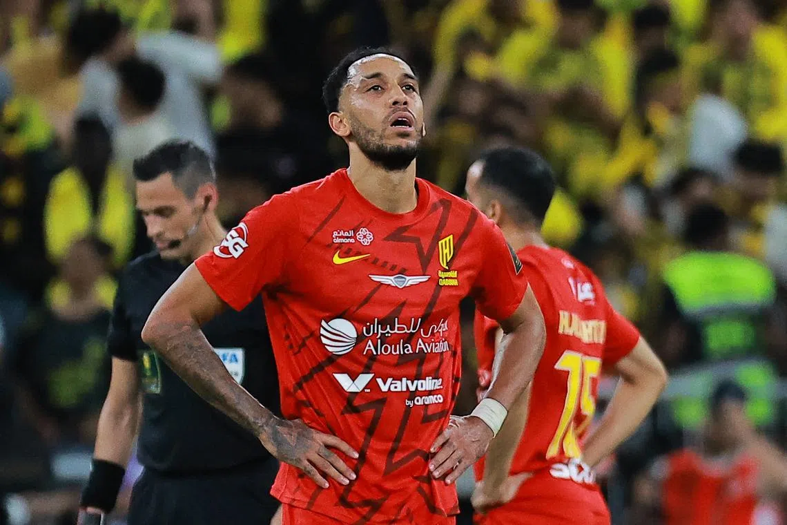 FILE PHOTO: Soccer Football - Saudi King's Cup - Final - Al Ittihad v Al Qadsiah - King Abdullah Sports City, Jeddah, Saudi Arabia - May 30, 2025 Al Qadsiah's Pierre-Emerick Aubameyang looks dejected after Al Ittihad's Karim Benzema scores their third goal REUTERS/Stringer/File Photo