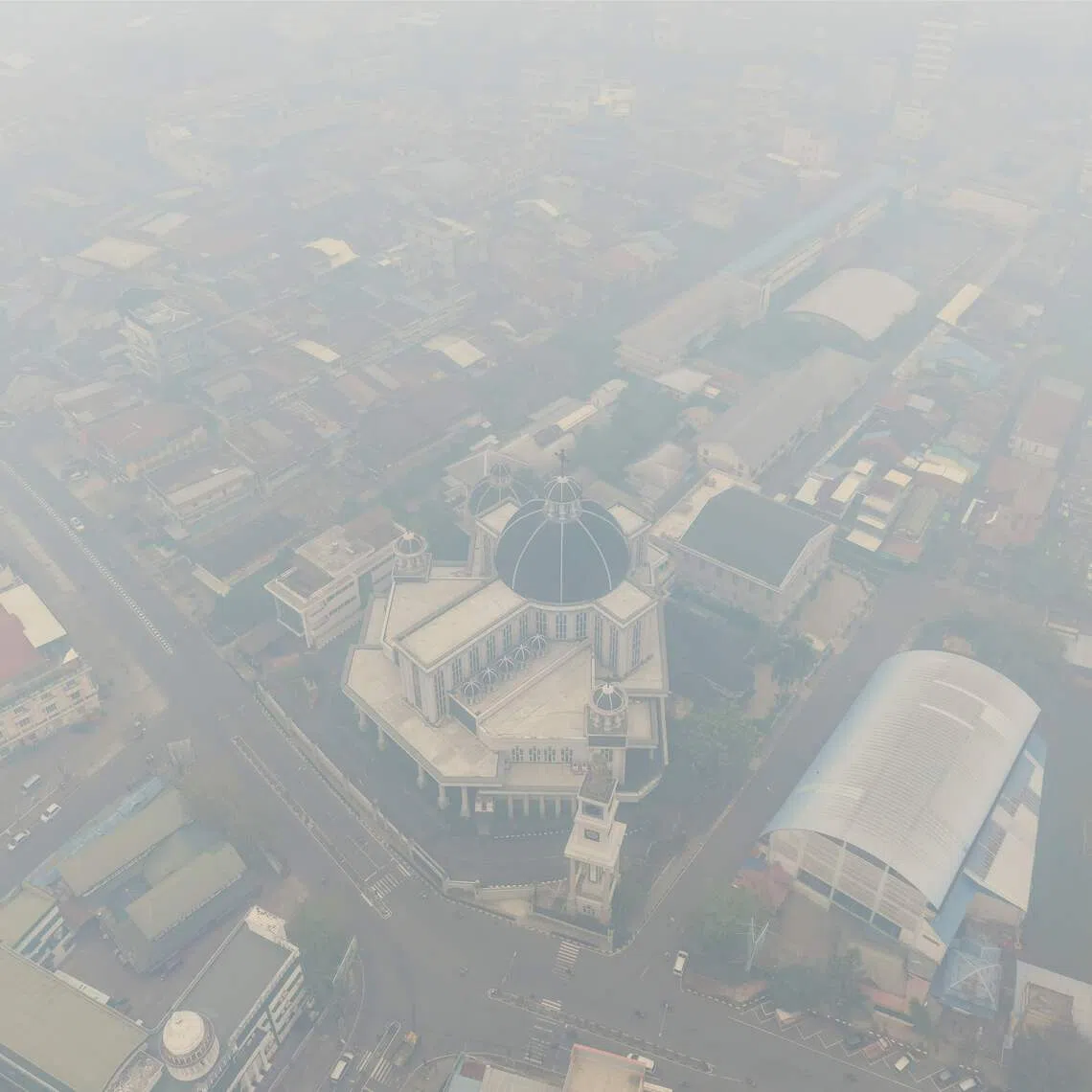 Haze from land and forest fires blanketing the city of Pontianak, West Kalimantan, on Sept 7.