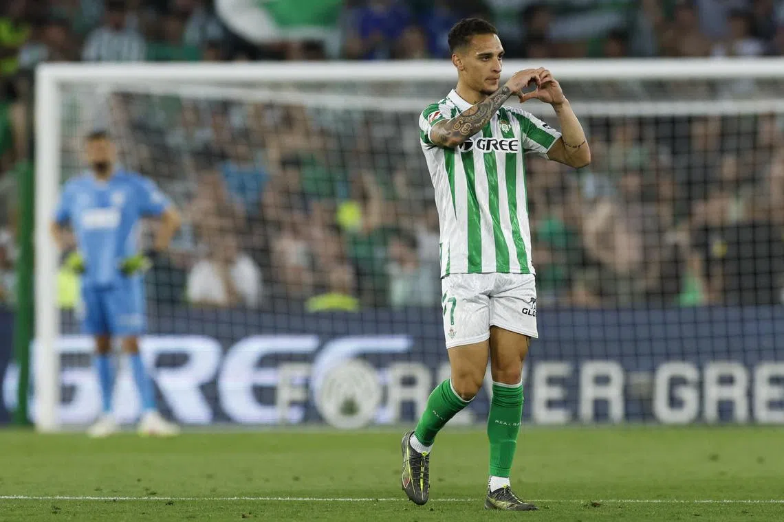 Real Betis' Antony celebrates scoring against Valencia in a La Liga match.