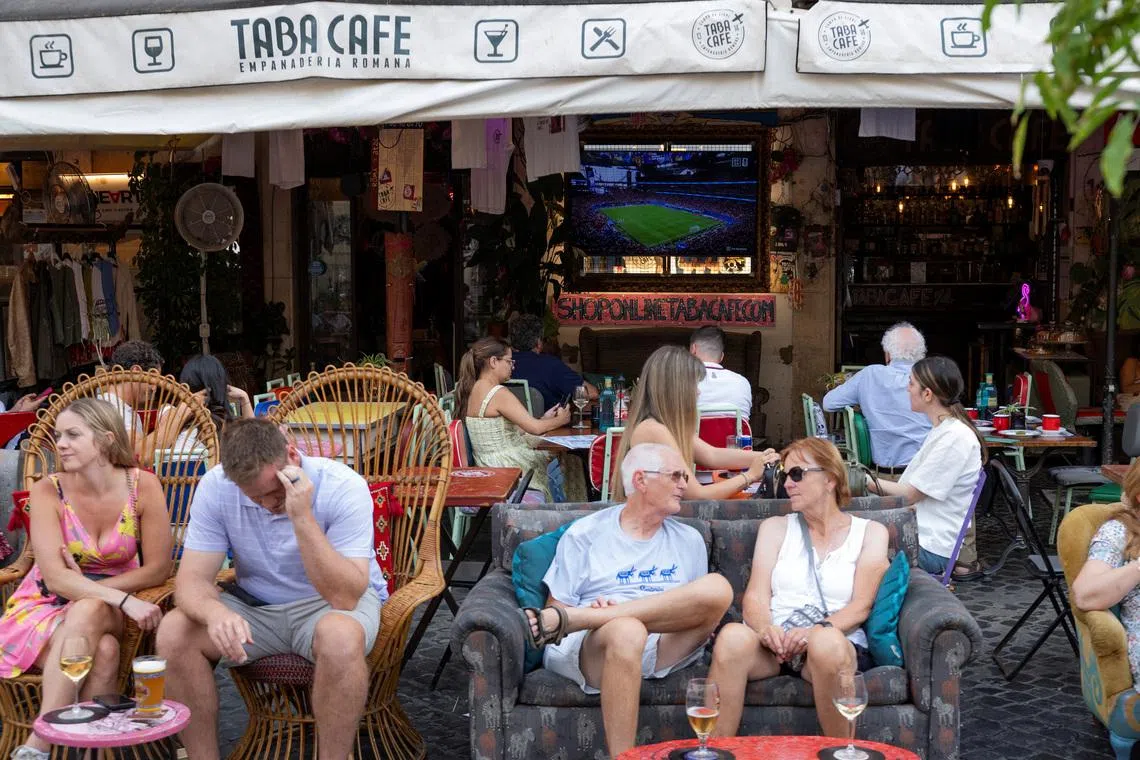 Italian fans look to global icons and underdogs to cure World Cup blues
