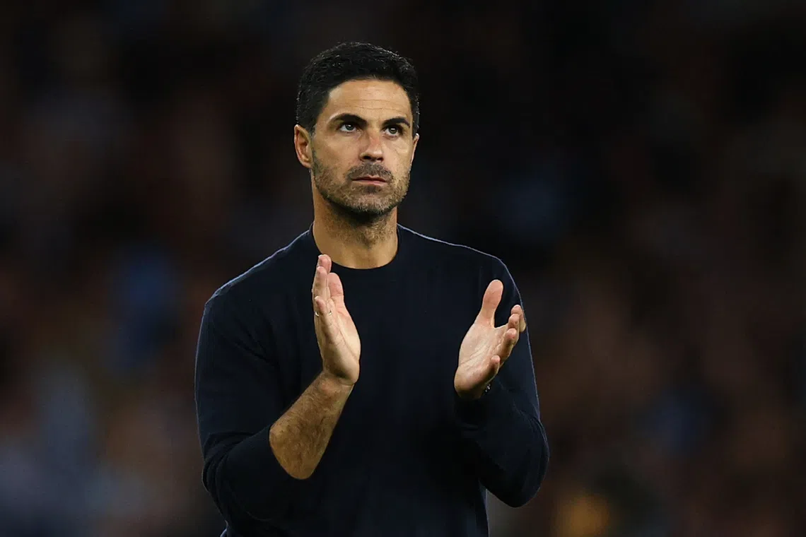 Soccer Football - Premier League - Arsenal v Coventry City - Emirates Stadium, London, Britain - August 21, 2026 Arsenal manager Mikel Arteta applauds fans after the match Action Images via Reuters/Peter Cziborra