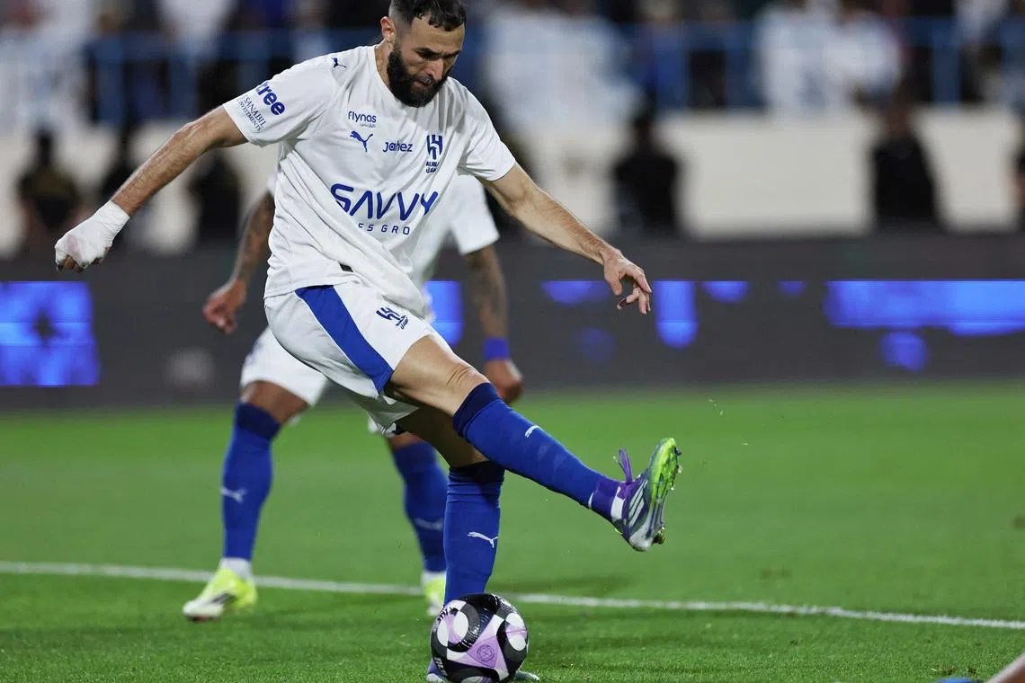 Soccer Football - Saudi Pro League - Al Okhdood v Al Hilal - Prince Hathloul Bin Absulaziz Sport City Stadium, Najran, Saudi Arabia - February 5, 2026  Al Hilal's Karim Benzema scores their first goal REUTERS/Hamad I Mohammed