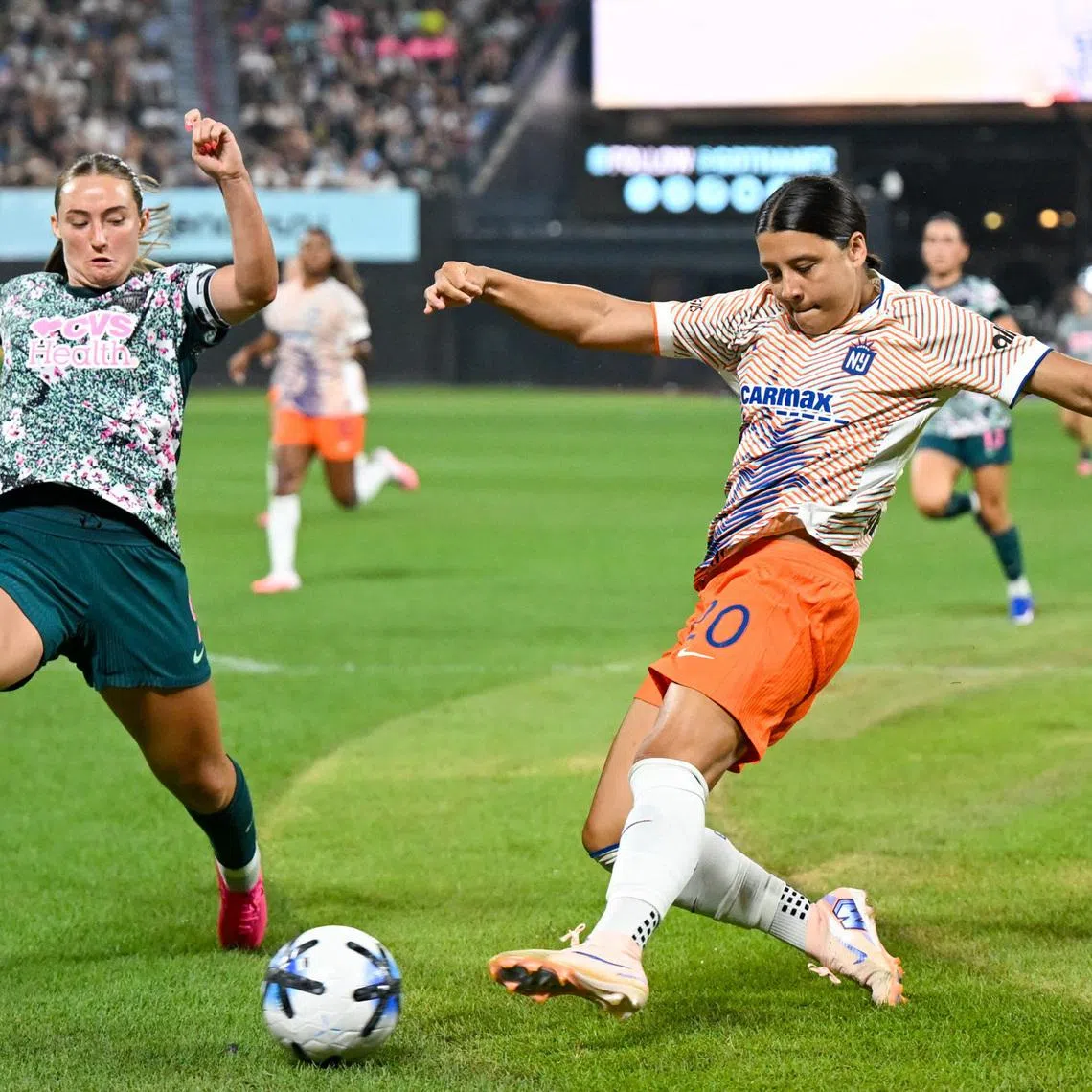 Jul 15, 2026; New York, NY, USA;  Gotham FC forward Sam Kerr (20) goes to shoot on goal during the Queens Classic match between Washington Spirit and Gotham FC at Citi Field. Mandatory Credit: Brenden Willsch-Imagn Images
