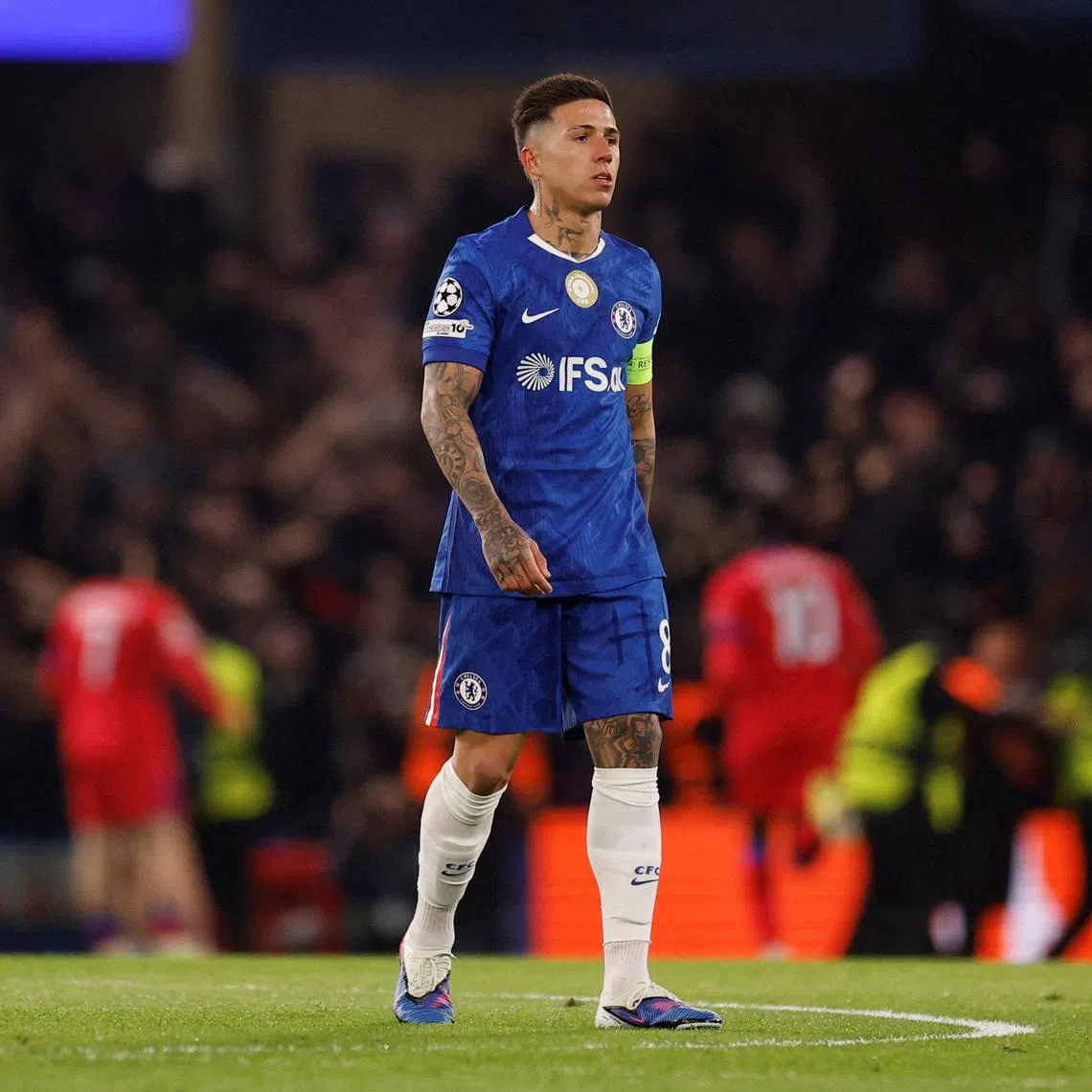 FILE PHOTO: Soccer Football - UEFA Champions League - Round 16 - Second Leg - Chelsea v Paris St Germain - Stamford Bridge, London, Britain - March 17, 2026 Chelsea's Enzo Fernandez looks dejected after Paris St Germain's Khvicha Kvaratskhelia scores their first goal Action Images via Reuters/Andrew Couldridge/File Photo