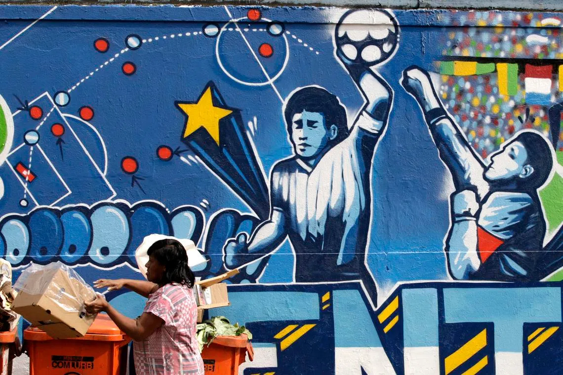 A mural depicting the famous “Hand of God” goal by former Argentine football star Diego Maradona in Rio de Janeiro.