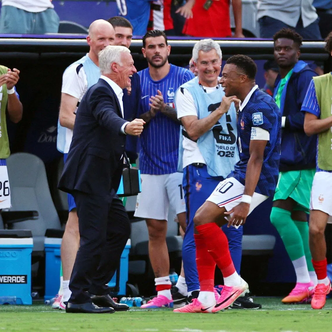 Soccer Football - FIFA World Cup 2026 - Round of 32 - France v Sweden - New York New Jersey Stadium, East Rutherford, New Jersey, U.S. - June 30, 2026 France's Kylian Mbappe celebrates scoring their first goal with coach Didier Deschamps IMAGN IMAGES via Reuters/Vincent Carchietta
