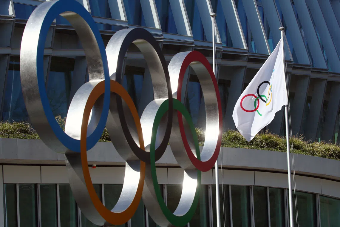 The Olympic rings are pictured in front of the International Olympic Committee (IOC) in Lausanne, Switzerland, March 24, 2020. REUTERS/Denis Balibouse/File Photo
