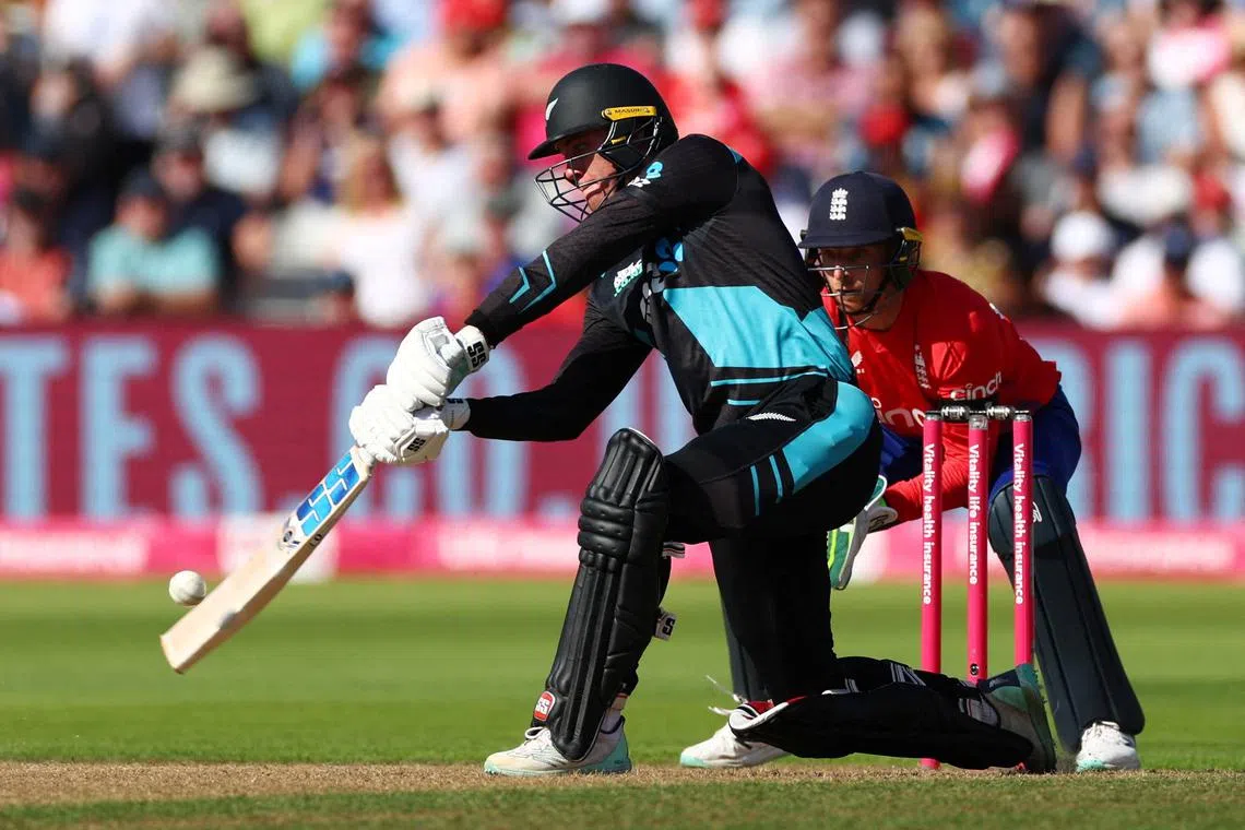 FILE PHOTO: Cricket - IT20 International - England v New Zealand - Edgbaston Cricket Ground, Birmingham, Britain - September 3, 2023 New Zealand's Finn Allen in action as he hits a six off the bowling of England's Adil Rashid Action Images via Reuters/Andrew Boyers/File Photo