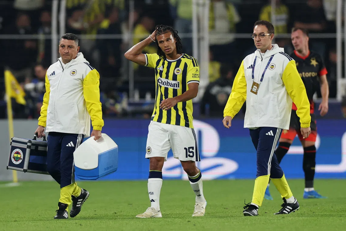 Soccer Football - UEFA Champions League - Fenerbahce v Slavia Prague - Sukru Saracoglu Stadium, Istanbul, Turkey - October 20, 2026  Fenerbahce's Nathan Ake walks off the pitch after sustaining an injury REUTERS/Murad Sezer
