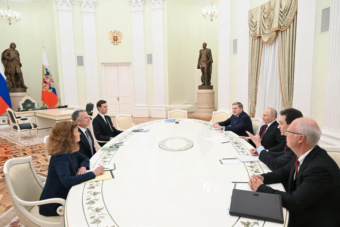 US special envoy Steve Witkoff and Mr Trump's son-in-law Jared Kushner (both left) meeting at the Kremlin with Russian President Vladimir Putin (third from right) and other Russian officials.