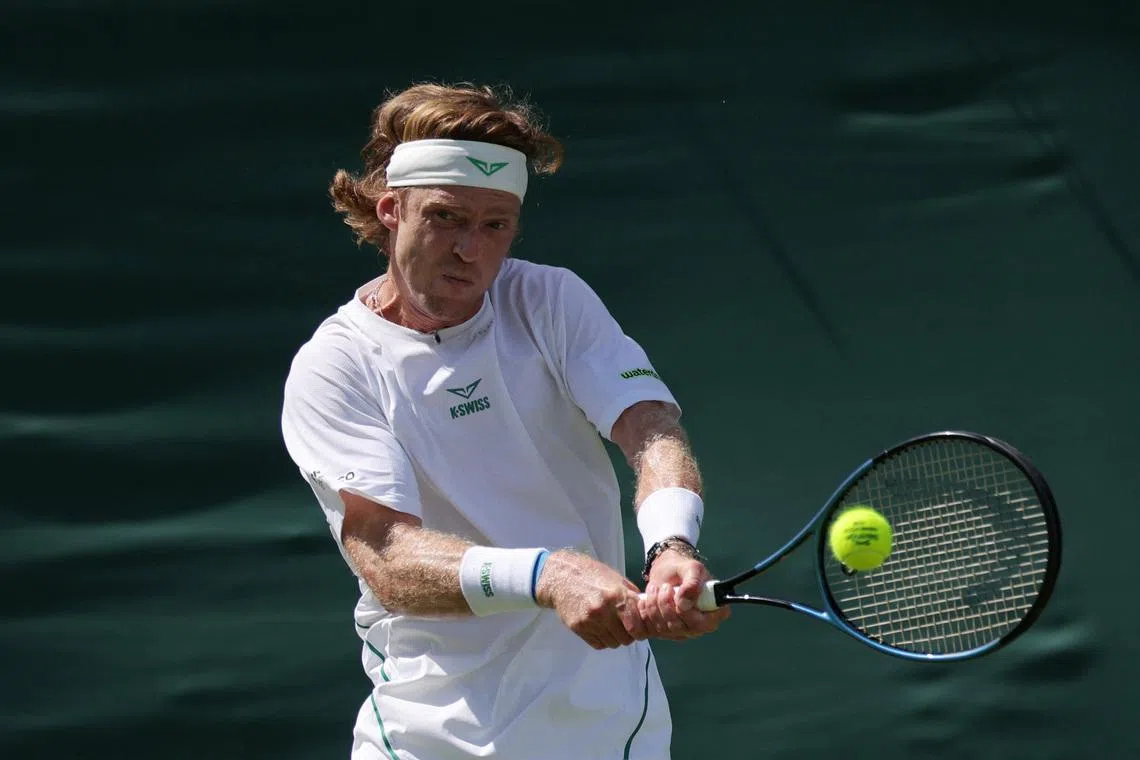 Tennis - Wimbledon - All England Lawn Tennis and Croquet Club, London, Britain - June 29, 2026 Russia's Andrey Rublev in action during his first round match against Russia's Roman Safiullin REUTERS/Marko Djurica