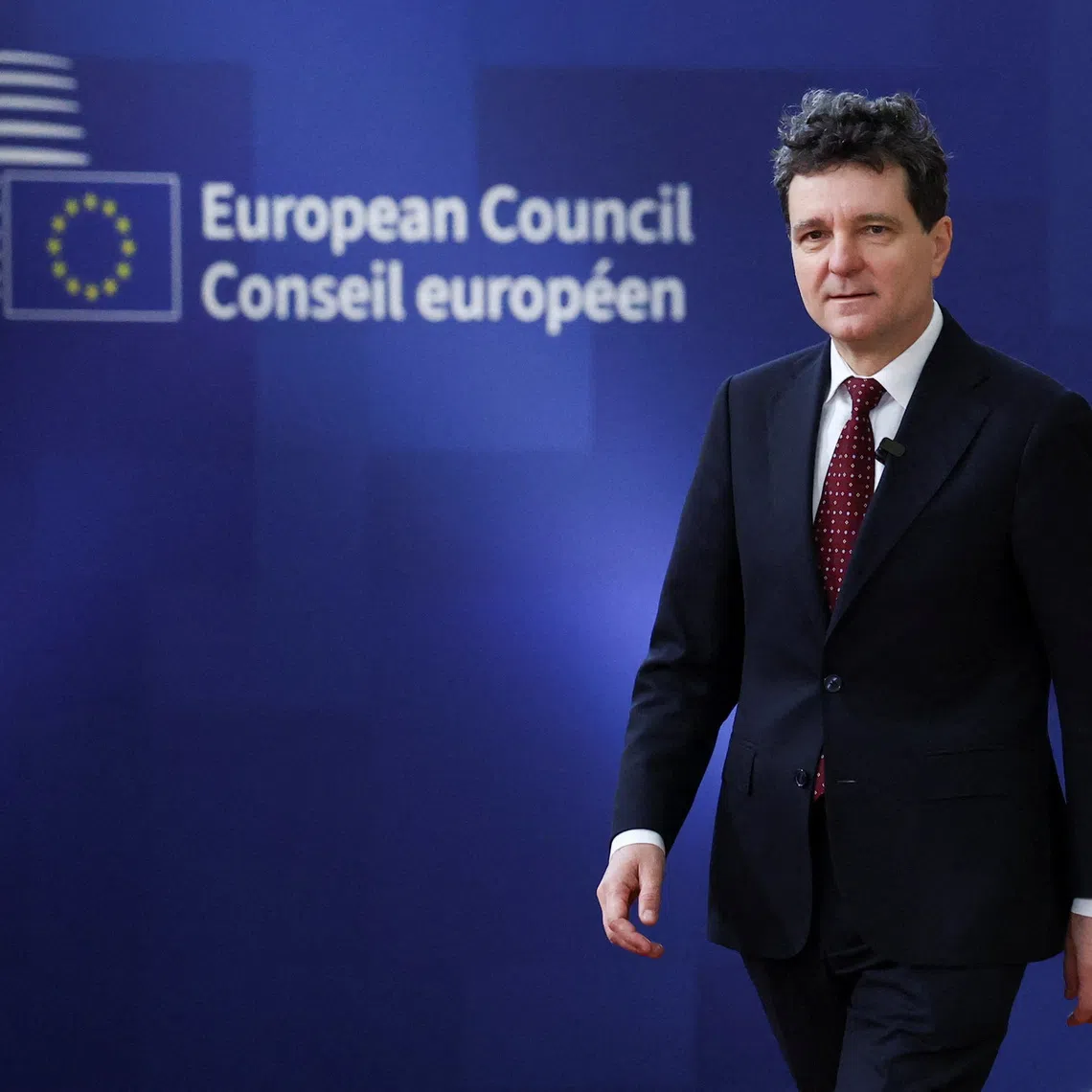 Romania's President Nicusor Dan arrives at a European Union leaders' summit in Brussels, Belgium, December 18, 2025. REUTERS/Yves Herman