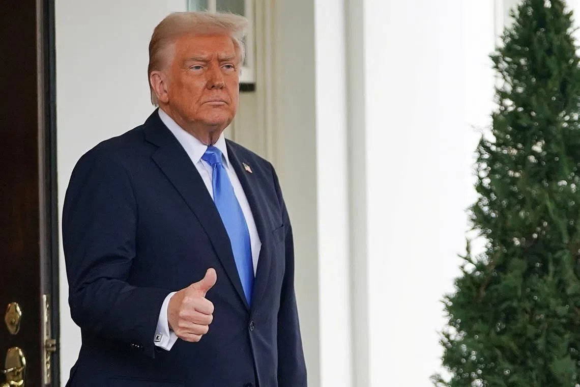U.S. President Donald Trump gestures, after his meeting with Jordan's King Abdullah, at the White House in Washington, D.C. U.S., February 11, 2025. REUTERS/Nathan Howard