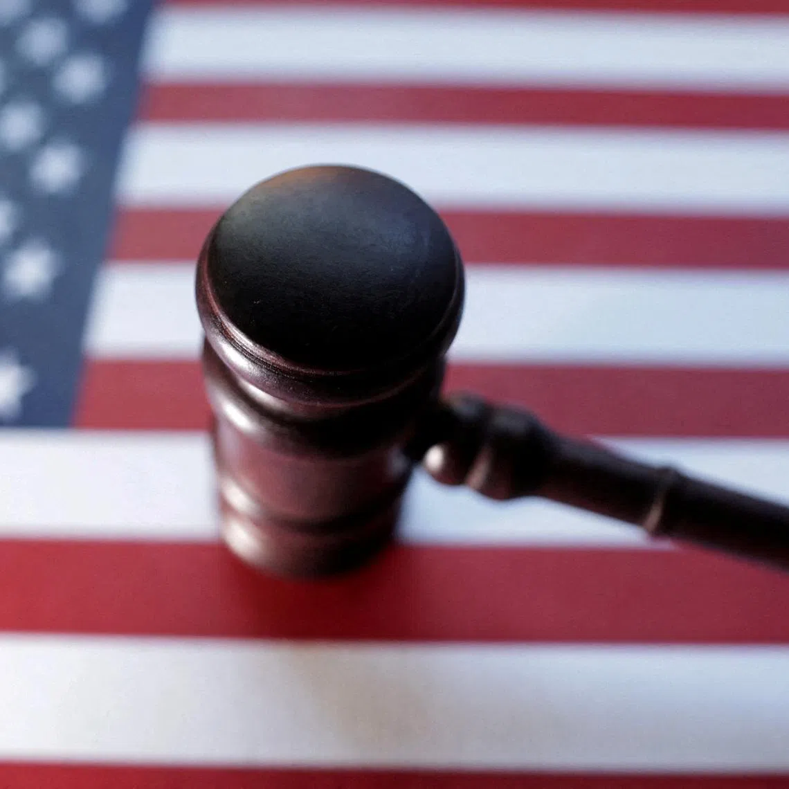 FILE PHOTO: U.S. flag and Judge gavel are seen in this illustration taken, August 6, 2024. REUTERS/Dado Ruvic/Illustration/File Photo