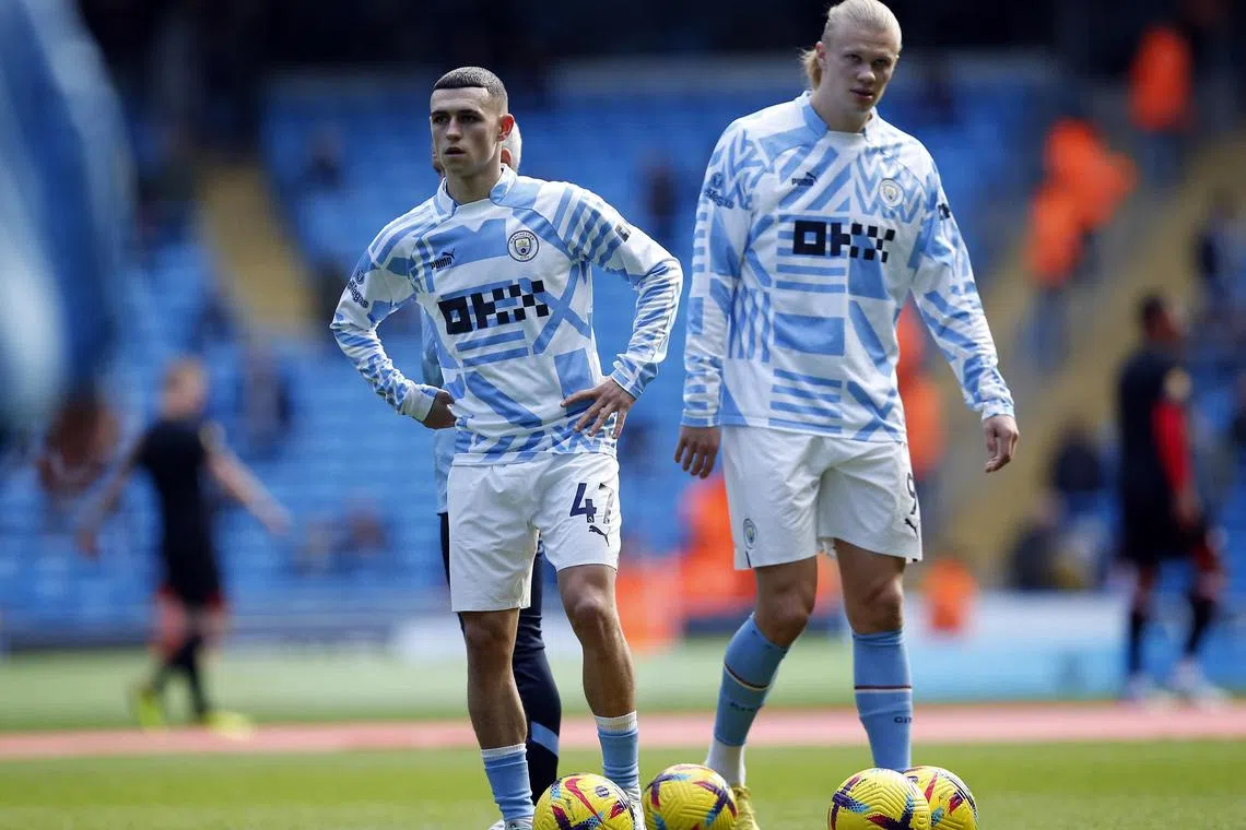 Manchester City striker Erling Haaland (right) and forward Phil Foden will be key to the team's title charge.