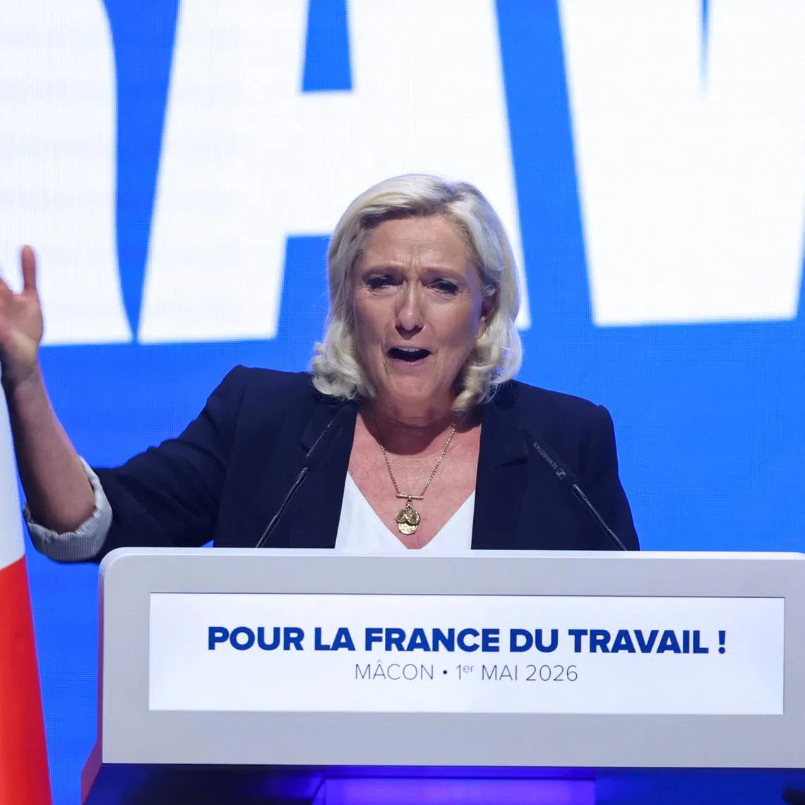 French far-right leader Marine Le Pen speaks during a political rally of the French far-right Rassemblement National (National Rally - RN) political party in Macon as the country marks the May Day national holiday, France, May 1, 2026. REUTERS/Manon Cruz