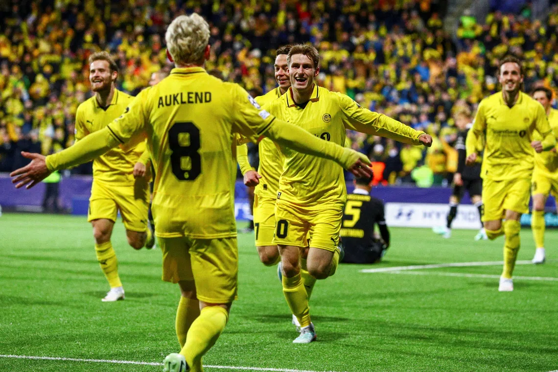 Soccer Football - UEFA Champions League - Bodo/Glimt v Borussia Dortmund - Aspmyra Stadion, Bodo, Norway - October 14, 2026 Bodo/Glimt's Fredrik Sjovold celebrates scoring their first goal with Sondre Auklend Mats Torbergsen/NTB via REUTERS