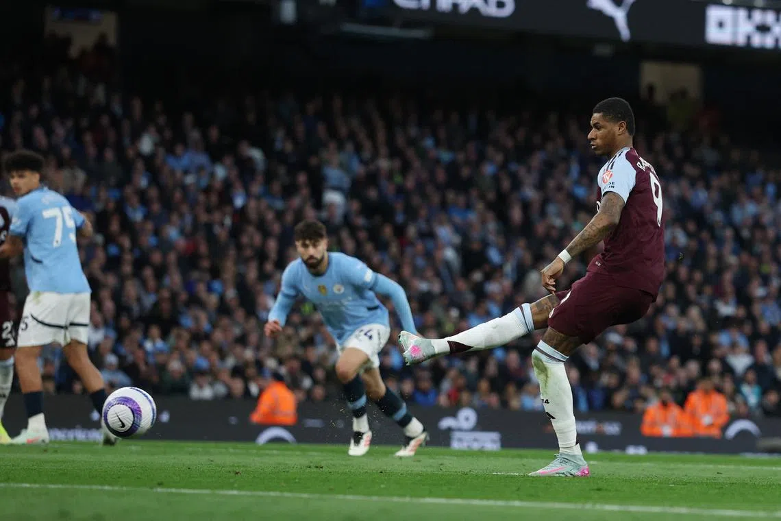 FILE PHOTO: Soccer Football - Premier League - Manchester City v Aston Villa - Etihad Stadium, Manchester, Britain - April 22, 2025 Astpn Villa's Marcus Rashford scores their first goal from the penalty spot Action Images via Reuters/Phil Noble/File Photo