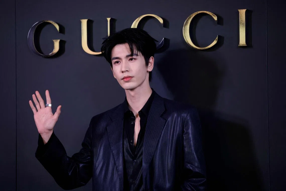 Chinese actor Zhang Linghe attends the Gucci Cruise 2027 collection fashion show at Times Square in New York on May 16, 2026. 