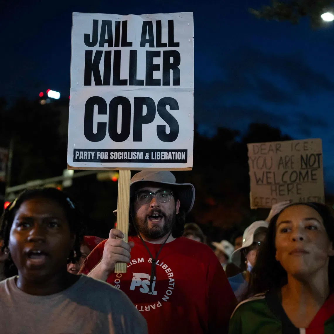 Protesters outside the Texas State Capitol in Austin, Texas, on Sept 21, a day after a Venezuelan national was shot and wounded during an ICE operation.