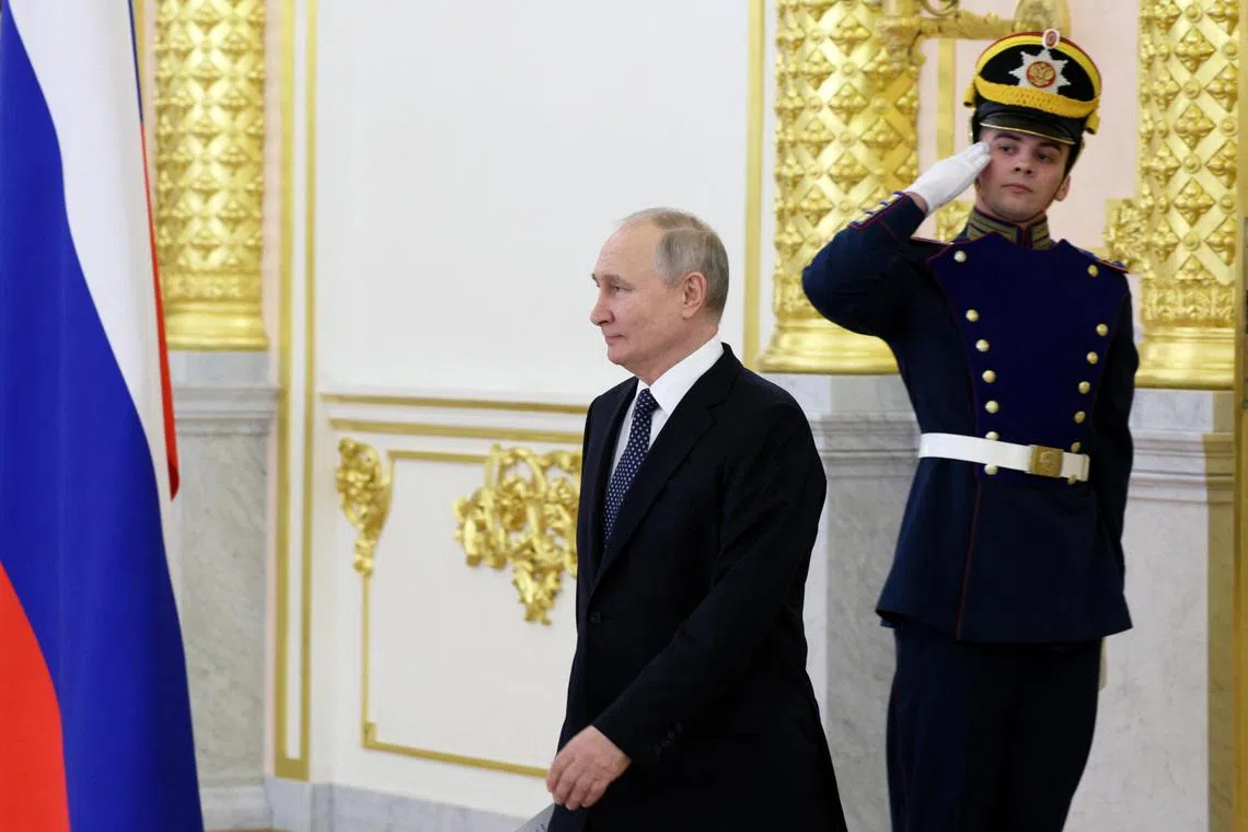 Russian President Vladimir Putin attends a ceremony to receive diplomatic credentials from newly appointed foreign ambassadors, at the Kremlin in Moscow.