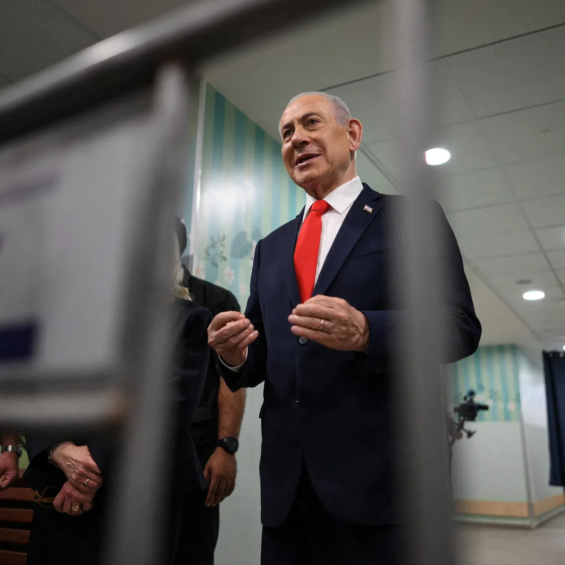Israel's Prime Minister Benjamin Netanyahu speaks to the media after voting at a polling station in Jerusalem, Israel, on the day of Israel's legislative election, October 27, 2026. Jewel Samad/Pool via REUTERS